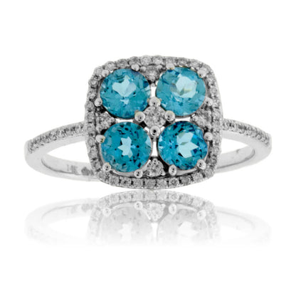 Four Blue Topaz & Diamond Halo Style Ring